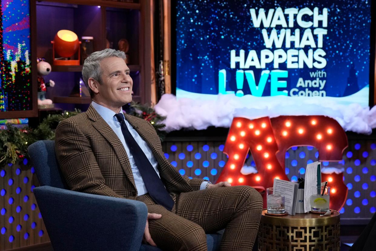 Andy Cohen And Anderson Cooper Take Mystery Shots During CNN's New Year's Eve Broadcast