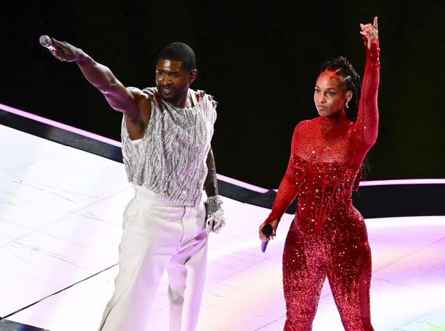 <p>PATRICK T. FALLON/AFP via Getty</p> Alicia Keys and Usher performing at the Super Bowl halftime show.