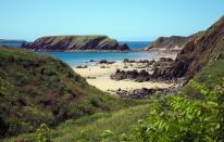 <p>A hidden gem on the western edge of Pembrokeshire, Marloes Sands is a wide, curved National Trust beach with amazing scenery and wildlife to explore. There's safe swimming and lovely coastal walks that start from the car park, plus you'll want to look out for seals and seabirds. The unique beach has sandstones and volcanic rocks for some of the most impressive geology around.</p><p><strong>Where to stay: </strong>A short drive from Marloes Sands is a four-bedroom house that sleeps six people. It's close to the coast and a walk to the village pub.</p><p><a class="link " href="https://airbnb.pvxt.net/LPBDN3" rel="nofollow noopener" target="_blank" data-ylk="slk:SEE INSIDE;elm:context_link;itc:0;sec:content-canvas">SEE INSIDE</a></p>