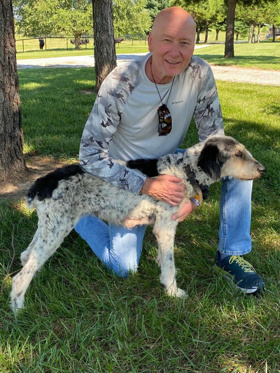 Recreational caver Rick Haley poses with Abby, a 13-year-old dog that he and fellow caver Gerry Keene rescued from a cave north of Perryville, Missouri.

"One week out..she’s making a comeback," Haley wrote on his Facebook page accompanying the photo.

Haley and a team of around 30 were mapping the cave as part of a project for the Cave Research Foundation when Haley was asked to help stage a rescue operation for the dog.