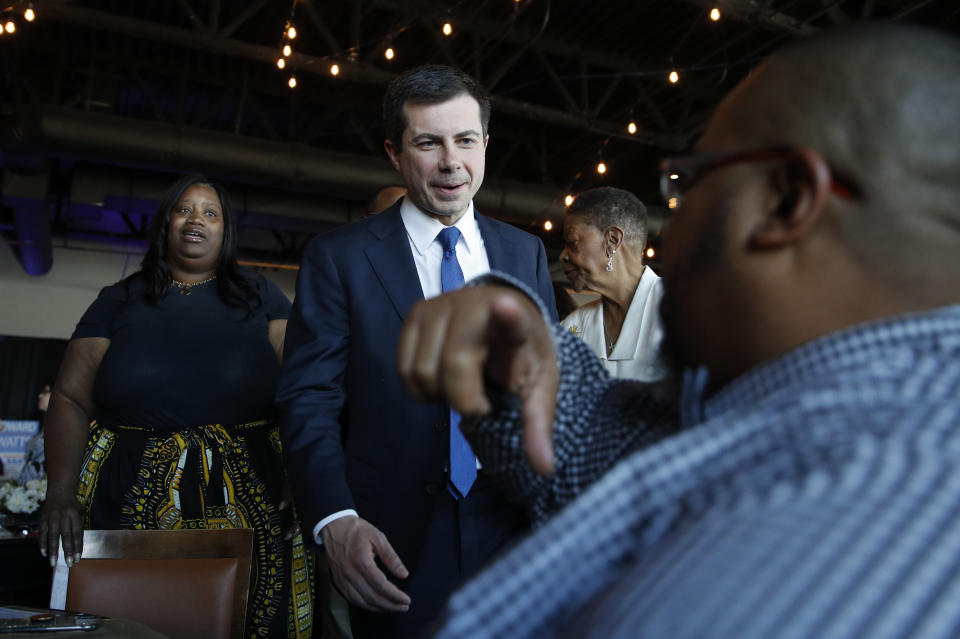 Democratic presidential candidate former South Bend Mayor Pete Buttigieg meets with people at the Nevada Black Legislative Caucus Black History Awards brunch Sunday, Feb. 16, 2020, in Las Vegas. (AP Photo/John Locher)