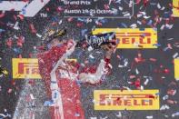 Oct 21, 2018; Austin, TX, USA; Ferrari driver Kimi Raikkonen (7) of Finland celebrates winning the United States Grand Prix at Circuit of the Americas. Mandatory Credit: Jerome Miron-USA TODAY Sports