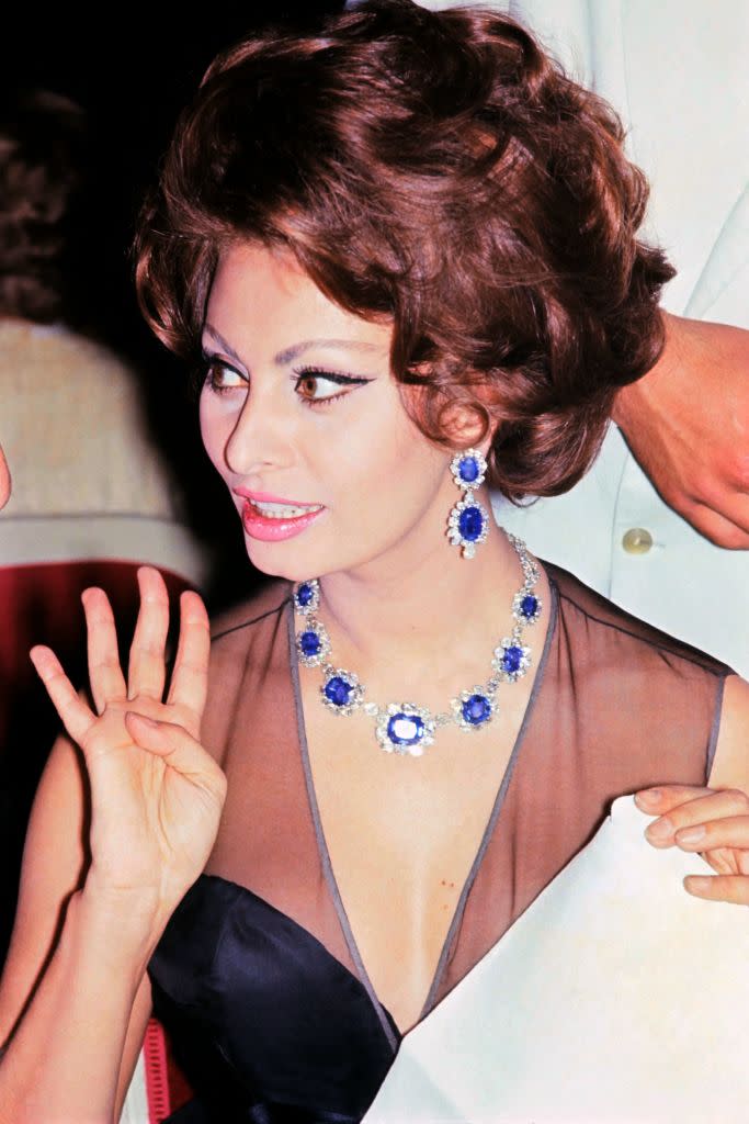 Sophia Loren at Cannes Film Festival in 1964, red carpet, sheer