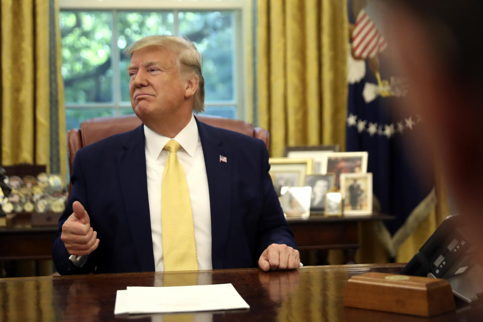 President Donald Trump listens he meets with Chinese Vice Premier Liu He in the Oval Office of the White House in Washington, Friday, Oct. 11, 2019. (AP Photo/Andrew Harnik)