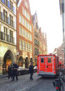 <p>Firefighters stand in downtown Muenster, Germany, Saturday, April 7, 2018. (Photo: dpa via AP) </p>