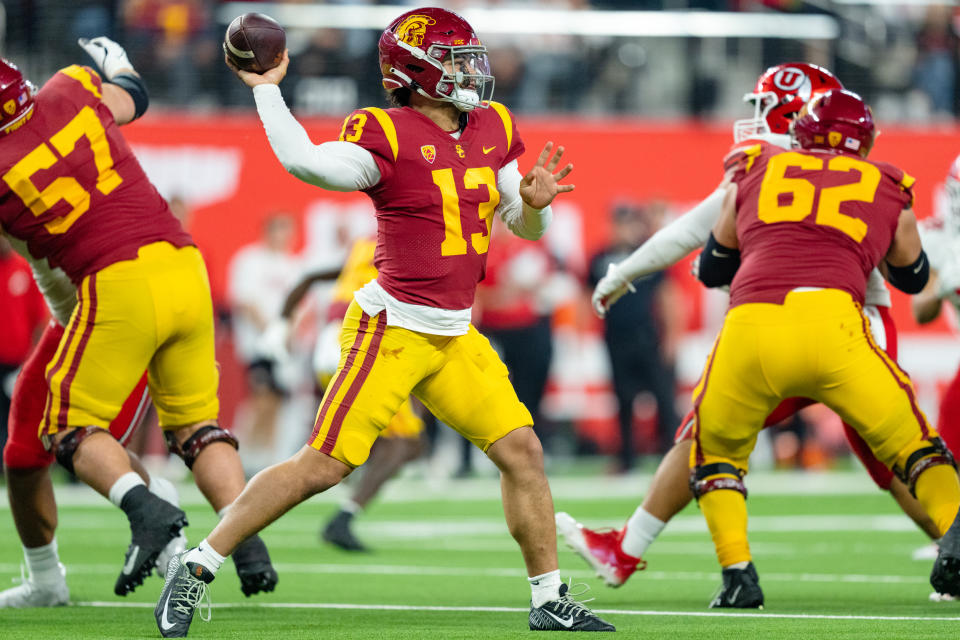 LAS VEGAS, NV - DECEMBER 2: Caleb Williams #13 of USC drops back for a pass during a game between the USC Trojans and the Utah Utes at Allegiant Stadium on December 2, 2022 in Las Vegas, Nevada. (Photo by Jason Allen/ISI Photos/Getty Images).