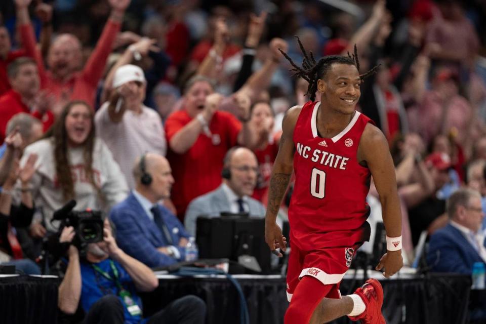 N.C State’s D.J. Horne (0) reacts after sinking a three point basket to give the Wolfpack an eight point lead over North Carolina in the second half during the ACC Men’s Basketball Tournament Championship at Capitol One Arena on Saturday, March 16, 2024 in Washington, D.C. Horne scored 29 point in the Wolfpack’s 84-76 victory.