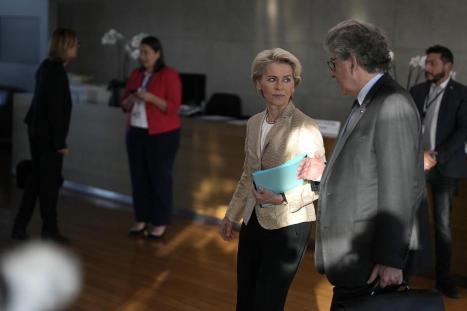 European Commission President Ursula von der Leyen, center, speaks with European Commissioner for Internal Market Thierry Breton prior to the weekly College of Commissioners meeting at EU headquarters in Brussels on Wednesday, Sept. 28, 2022. The European Union suspects that damage to two underwater natural gas pipelines was sabotage and is warning of retaliation for any attack on Europe's energy networks, EU foreign policy chief Josep Borrell said Wednesday. (AP Photo/Virginia Mayo)