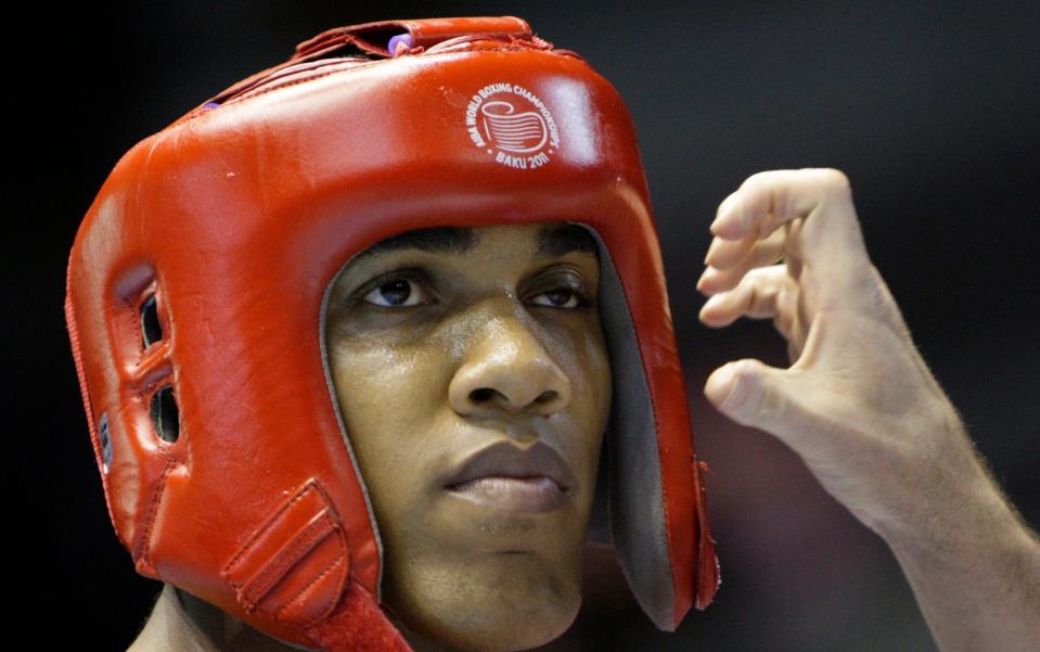 Anthony Joshua of Britain looks on after he lost against Medzhidov of Azerbaijan fight during their AIBA +91kg World Championships final boxing match in Baku - REUTERS