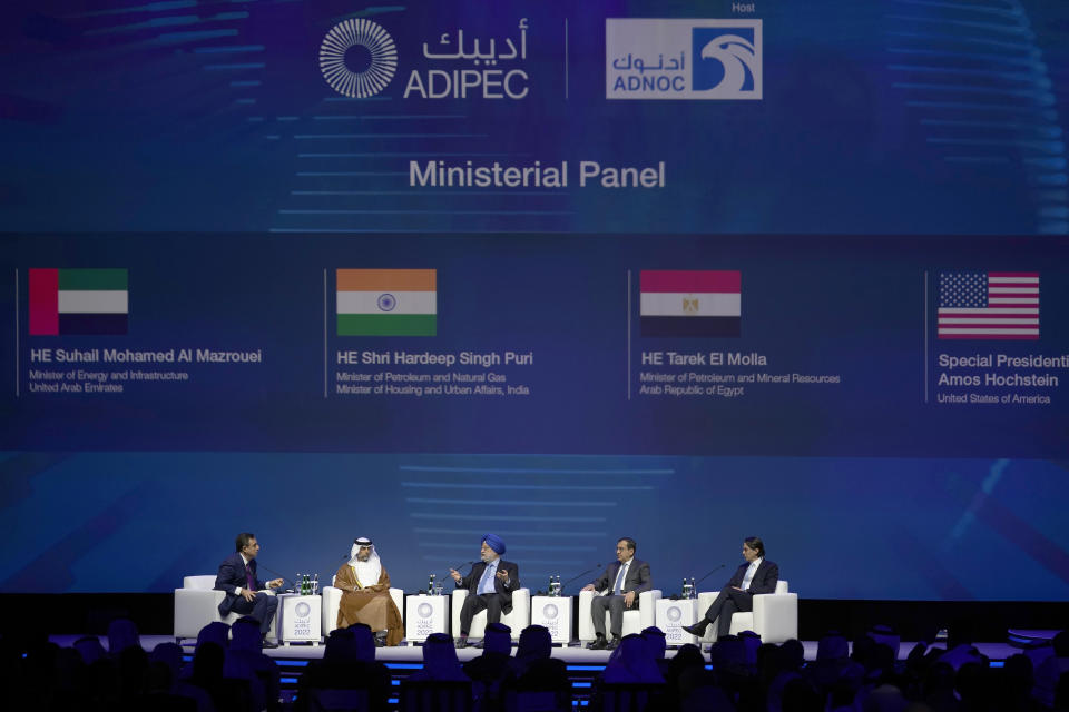 Second left to right; UAE Energy Minister Suhail al-Mazrouei, India's Minister of Petroleum and Natural Gas & Housing Shri Hardeep Puri, the U.S. Envoy for Energy Affairs Amos Hochstein and Minister of Petroleum and Mineral Resources Tarek EI Molla attend the opening ceremony of the Abu Dhabi International Petroleum Exhibition & Conference in Abu Dhabi, United Arab Emirates, Monday, Oct. 31, 2022. Saudi Arabia and the United Arab Emirates defended on Monday a decision by OPEC and its allies to cut oil production, even as an American envoy warned of "economic uncertainty" ahead for the world. (AP Photo/Kamran Jebreili)