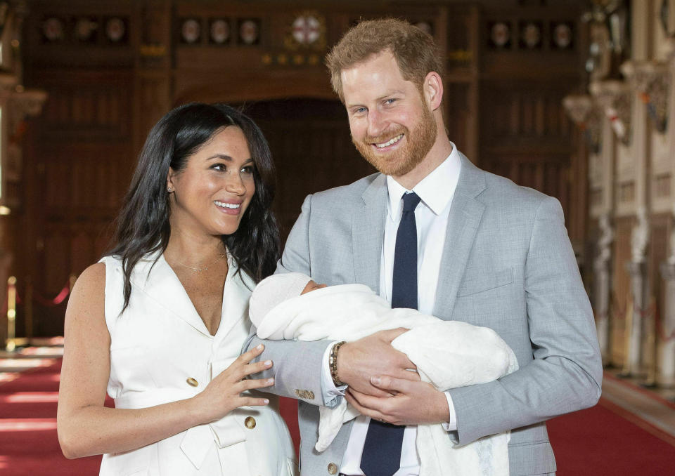 Britain's Prince Harry and Meghan, Duchess of Sussex, during a photo call with their newborn son Archie. Source: Dominic Lipinski/Pool via AP