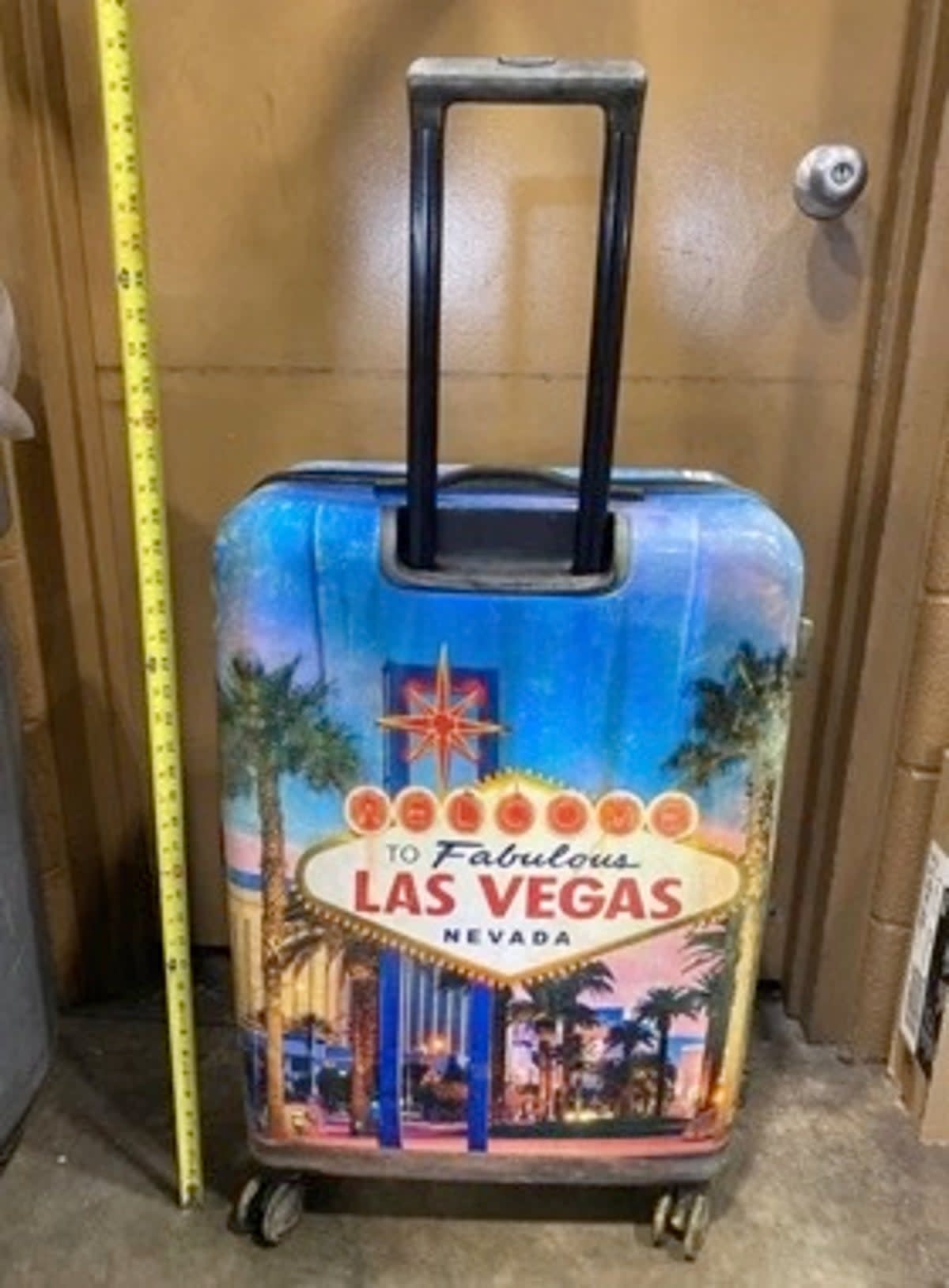 The boy’s body was stuffed inside this “Welcome to fabulous Las Vegas” suitcase (Indiana State Police)