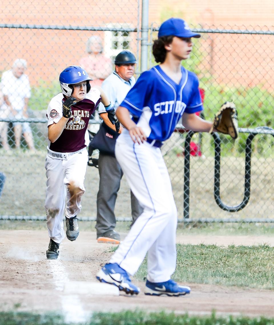 Weymouth Cal Ripken 12U's Jared Hixon runs to first base.