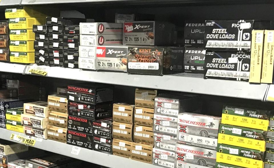 Boxes of ammunition are on display at Scott's Guns & Accessories in Horseheads. Under a new state law, anyone who wants to buy ammo needs to pass a background check run by the New York State Police.