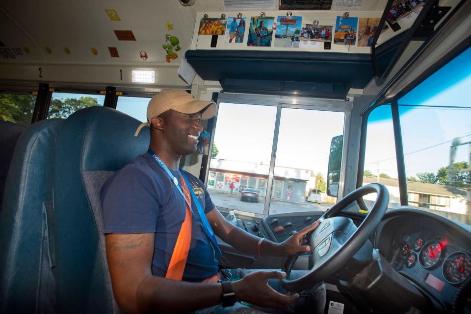 Cordarius Jones, a bus driver for the Escambia County School District, drives his route Thursday. Jones, also known as "Mr. Bus Driver," is making a name for himself on social media and his TikTok videos have amassed millions of views.