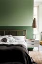 <p>Why settle for one paint color when you can choose two, right? This green two-tone wall, featuring different color weights, adds personality to this bedroom. </p>