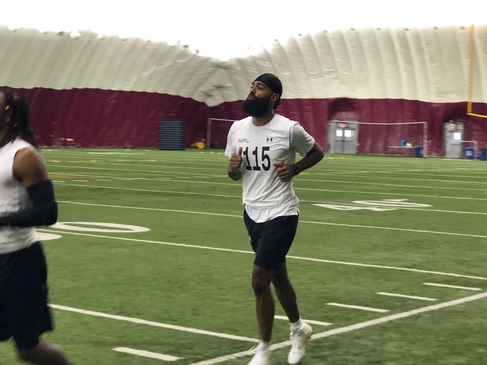 Former Arizona State quarterback Manny Wilkins gets loose at the XFL Arizona Showcase Friday in Tempe.