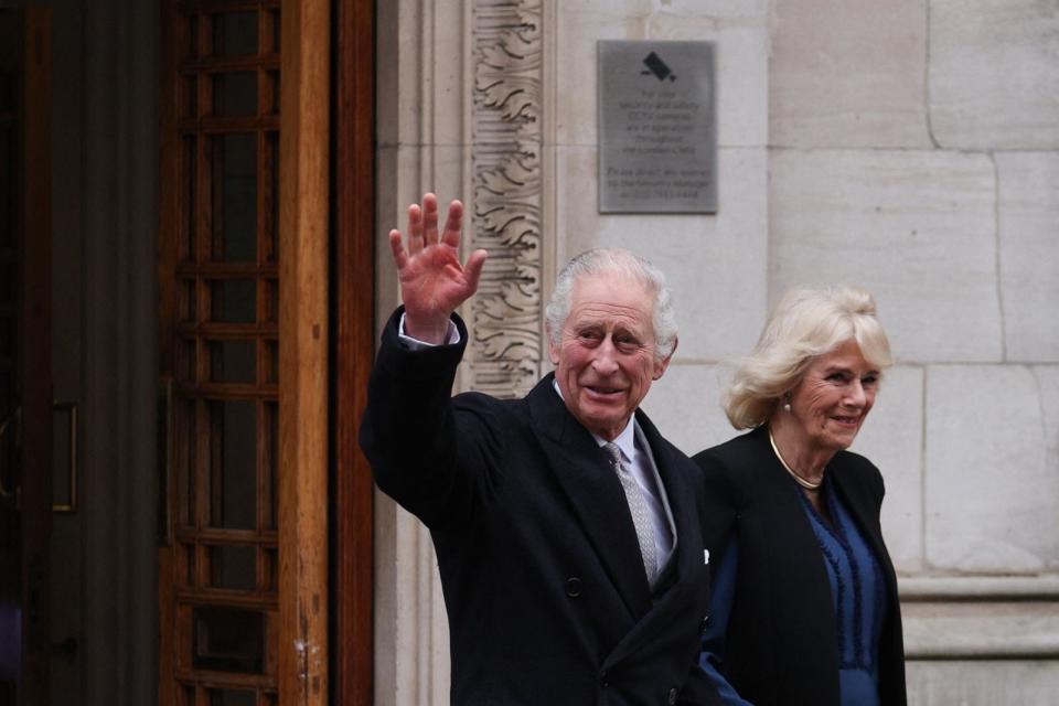 PHOTO: King Charles waves as he leaves, with Queen Camilla,  the London Clinic, in London, Jan. 29, 2024.  (Adrian Dennis/AFP via Getty Images)