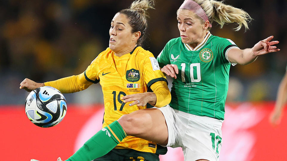 Katrina Gorry competes for a ball against Ireland.