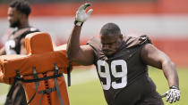 Cleveland Browns defensive tackle Andrew Billings runs a drill during an NFL football practice, Saturday, July 31, 2021, in Berea, Ohio. (AP Photo/Tony Dejak)