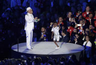 <p>The best dancer of the night, however, was this 8-year-old child who performed with percussionist Wilson das Neves. We would’ve watched him for 4.5 hours. No offense scantily-clad ladies. (AP Photo/Matthias Schrader) </p>