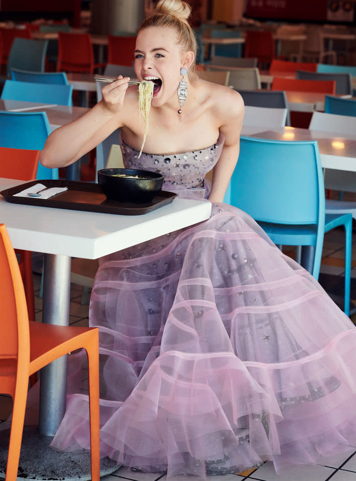 <p>Fanning in Armani Privé dress and earrings. Photographed by Pamela Hanson/LGA Management.</p>