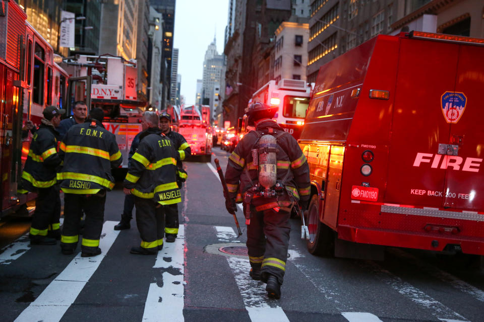 <p>First responders work on a fire in a residential unit at Trump tower in the Manhattan borough of New York City, New York, April 7, 2018. (Photo: Amr Alfiky/Reuters) </p>