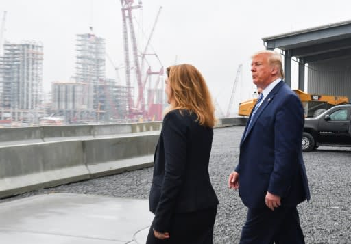 President Donald Trump tours a Shell petrochemical factory with Shell Oil company President Gretchen Watkins, saying that plastics pollution is not the fault of the US