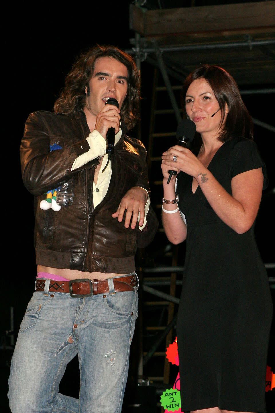 russell brand on stage with big brother host, davina mccall, at a live eviction in 2005