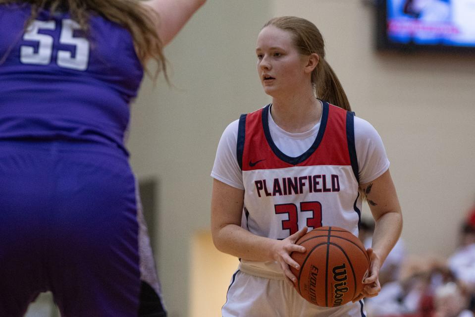 Plainfield Quakers senior power forward Payton Benge looks to pass the ball Jan 5, 2024, at Plainfield High School in Plainfield, Indiana.