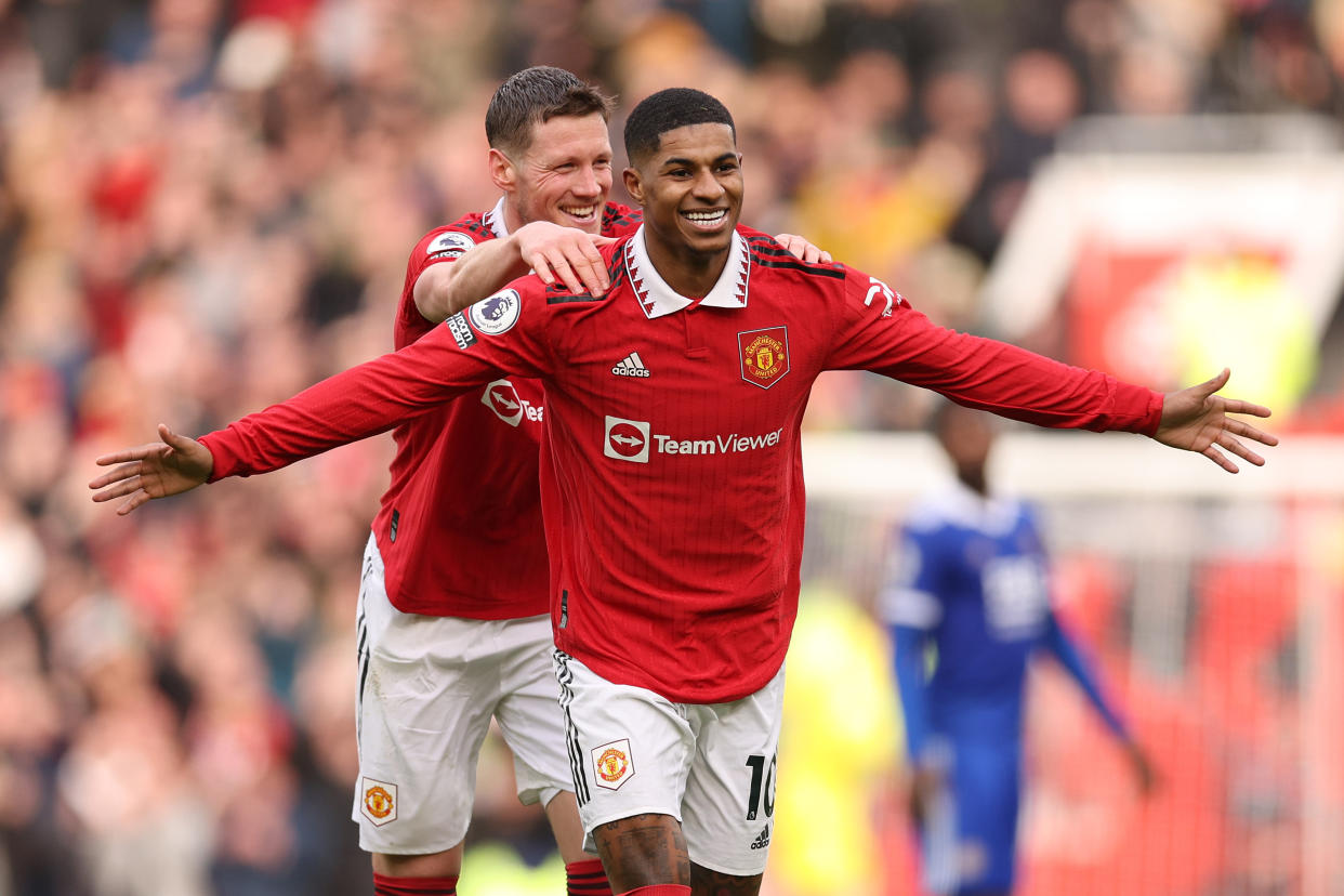 Man United forward Marcus Rashford celebrates scoring their second goal against Leicester City with teammate Wout Weghorst.