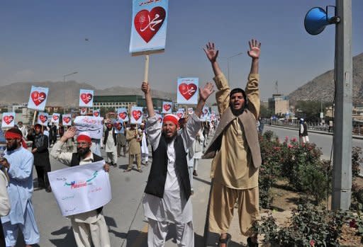 Afghan demonstrators shout slogans during an anti-US protest against an anti-Islam movie in Kabul on September 20. Hundreds of Afghans on Thursday protested for the first time against cartoons of the prophet Mohammed published in France and staged fresh rallies against a US-made anti-Islam film