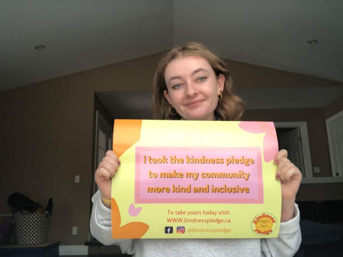 Fergus, Ont., student Abby Graham, 17, launched a Kindness Pledge on Jan. 19 that asks people to commit to bettering their community. (Upper Grand District School Board - image credit)