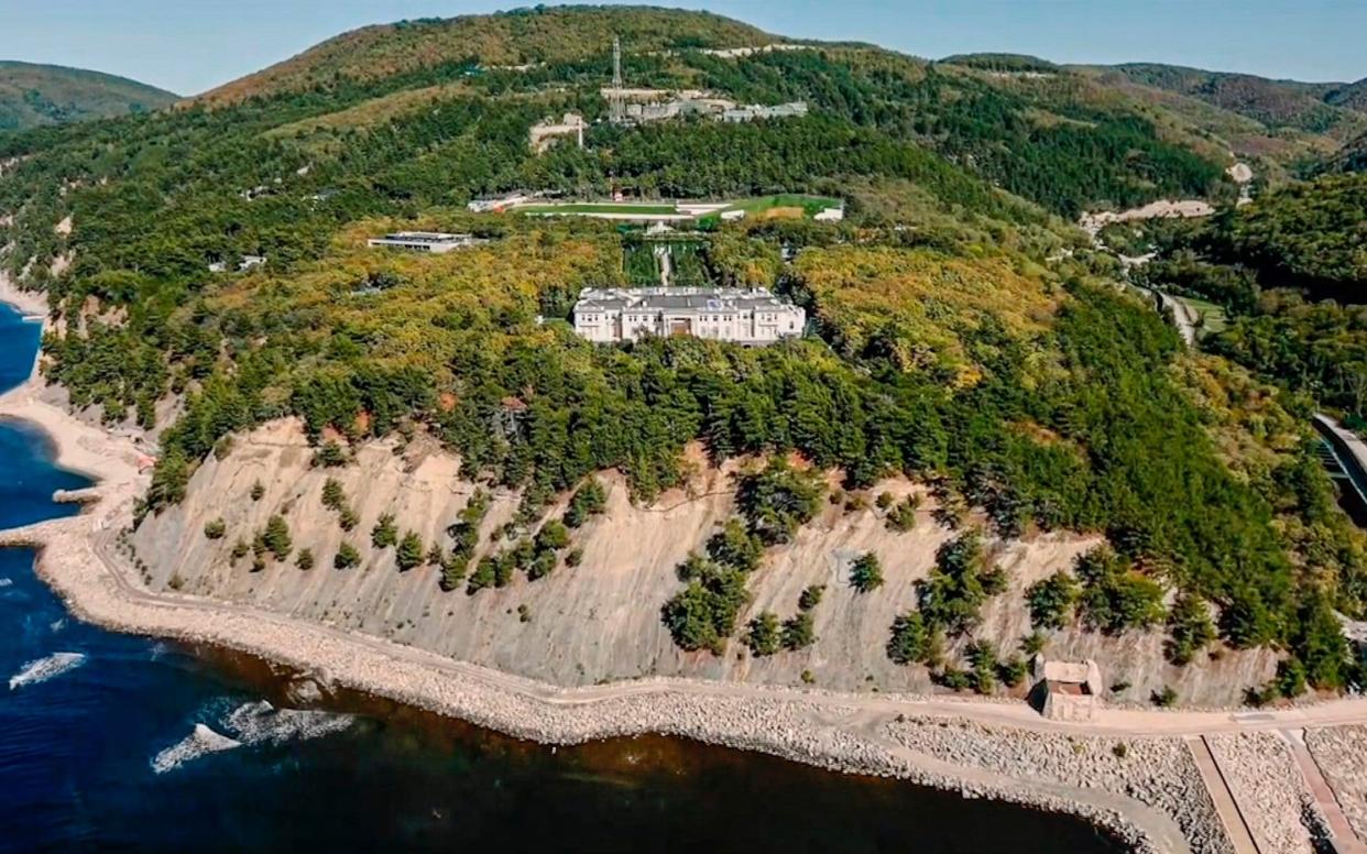 Alexei Navalny in his latest investigation claimed that President Vladimir Putin's friends helped him to a build a luxurious palace on the Black Sea coast - Navalny Life YouTube Channel via AP