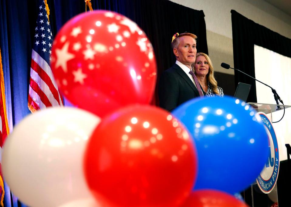 Sen. James Lankford speaks to supporters with his wife, Cindy, during an election night watch party in Oklahoma City on Nov. 8.