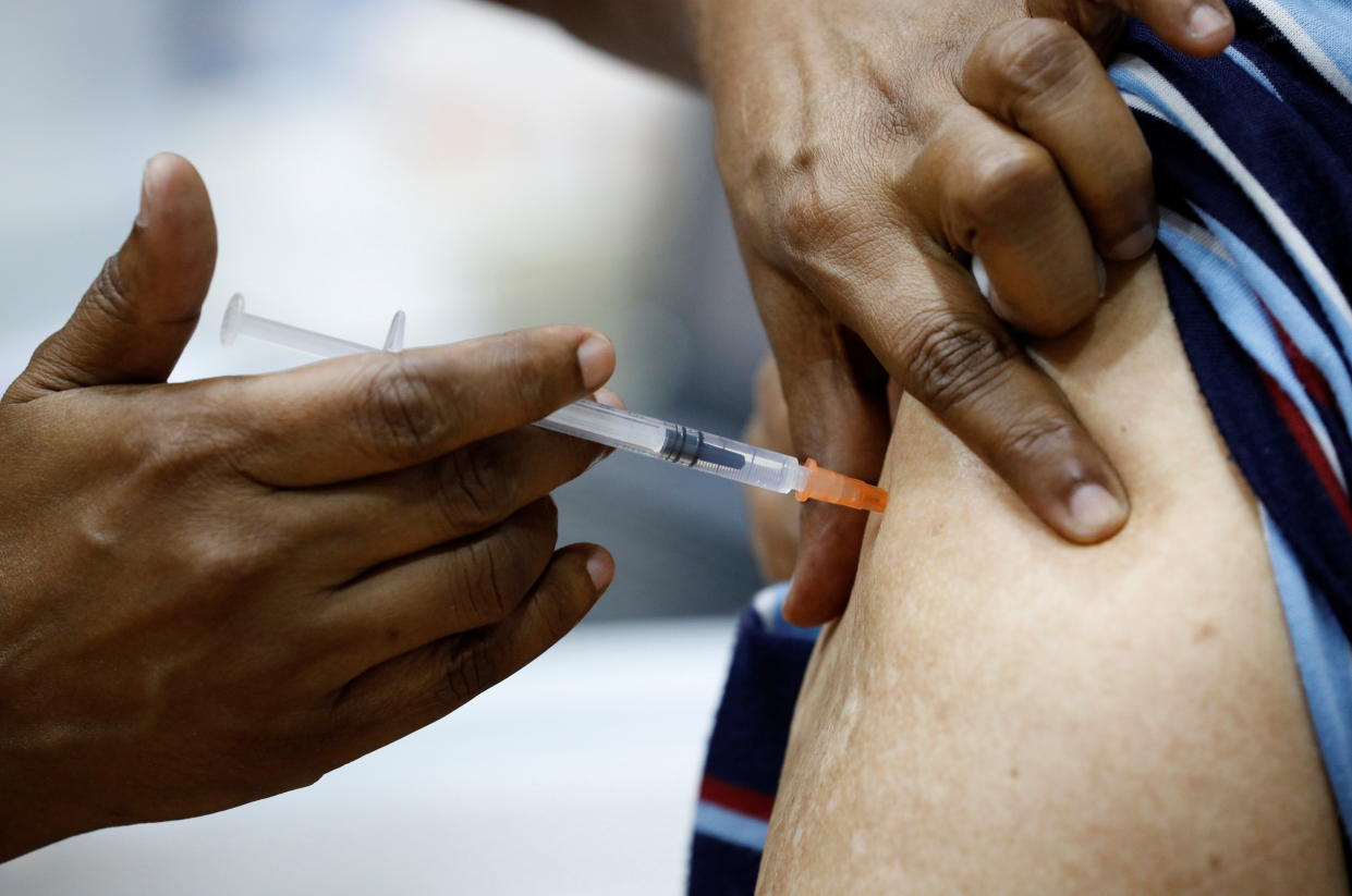 A man being vaccinated at a coronavirus disease vaccination centre in Singapore. (Reuters file photo)
