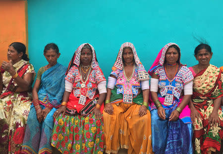 Tribal women gather to protest against a proposed power plant in Pedaveedu village, in Gurrambodu Thanda, Telangana, June 12, 2018. Picture taken June 12, 2018. REUTERS/Neha Dasgupta