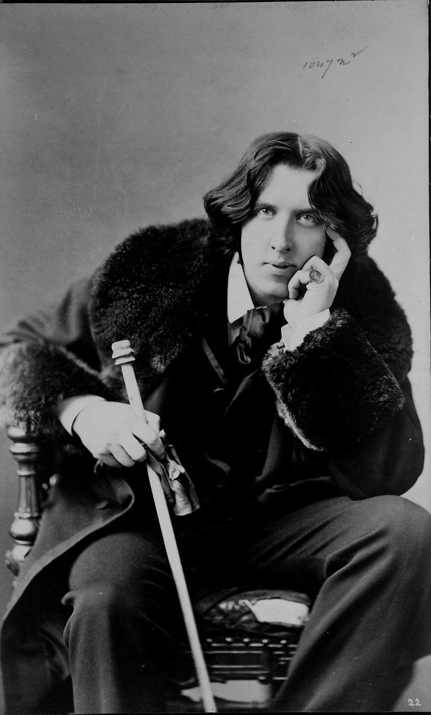 <p>Mirroring this <a href="https://www.townandcountrymag.com/leisure/arts-and-culture/reviews/a2382/best-oscar-wilde-quotes/" rel="nofollow noopener" target="_blank" data-ylk="slk:infamously stylish and style-obsessed writer;elm:context_link;itc:0;sec:content-canvas" class="link ">infamously stylish and style-obsessed writer</a> ("a<span class="redactor-unlink"> well-tied tie is the first serious step in life</span>," he once said) calls for embracing the full dandy. Think: velvet blazers, fur-trimmed coats, pinky rings—anything that screams opulence. </p>