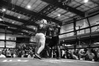 <p>IAB deputy inspector Carole Rowe corners police officer Lorangy Vasquez during a tag team match at the “Bronx Tough Turkey Tussle” in the Hunts Point section of the Bronx, New York, on Nov. 16, 2017. (Photo: Gordon Donovan/Yahoo News) </p>