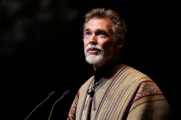 PHOTO: John Easterling delivers a tribute during the Memorial Service for Olivia Newton-John at Hamer Hall, Feb. 26, 2023, in Melbourne, Australia. (Asanka Ratnayake/Getty Images)