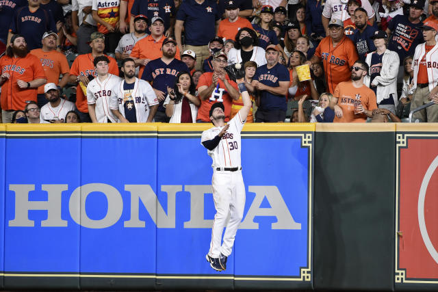 Oakland Athletics left fielder Tony Kemp catches a fly out hit by