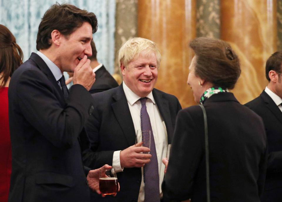 The PM seemed to be having a whale of a time with Mr Trudeau and Princess Anne (PA)