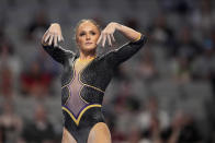 LSU's Savannah Schoenherr competes on the balance beam during the NCAA women's gymnastics championships in Fort Worth, Texas, Thursday, April 18, 2024. (AP Photo/Tony Gutierrez)