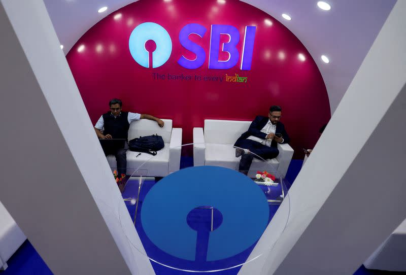 FILE PHOTO: The logo of State bank of India is pictured in a stall at the Vibrant Gujarat Global Trade Show at Gandhinagar