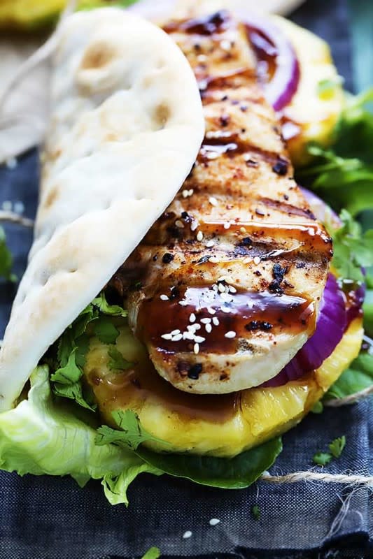 <p>Le Creme de La Crumb</p><p>Grilled pineapple teriyaki chicken Wraps filled with juicy, seasoned, grilled chicken topped with tart pineapple and tangy teriyaki sauce all wrapped in soft pita bread.</p><p><strong>Get the recipe: <a href="https://www.lecremedelacrumb.com/grilled-pineapple-teriyaki-chicken-wraps" rel="nofollow noopener" target="_blank" data-ylk="slk:Grilled Pineapple Teriyaki Chicken Wraps;elm:context_link;itc:0;sec:content-canvas" class="link rapid-noclick-resp"><em>Grilled Pineapple Teriyaki Chicken Wraps</em></a></strong></p>