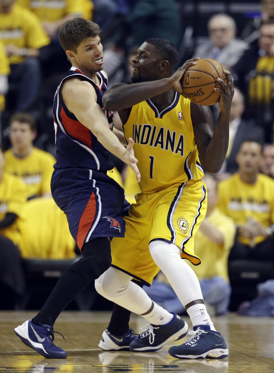 Indiana Pacers' Lance Stephenson (1) is defended by Atlanta Hawks' Kyle Korver during the first half in Game 1 of an opening-round NBA basketball playoff series on Saturday, April 19, 2014, in Indianapolis. (AP Photo/Darron Cummings)
