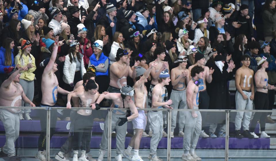 The Blue Knights cheering section erupts after Sandwich scored their first goal early in the first period as Dennis-Yarmouth/Cape Cod Tech/Cape Cod Academy and Sandwich met in tournament hockey action at Gallo Arena on Thursday night.