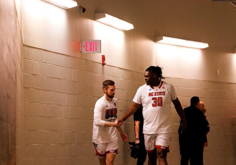 N.C. State’s Alex Nunnally and DJ Burns, Jr. walk the tunnel to the court prior to the Wolfpack’s NCAA Tournament second round game against Oakland on Saturday, March 23, 2024, at PPG Paints Arena in Pittsburgh, Pa.