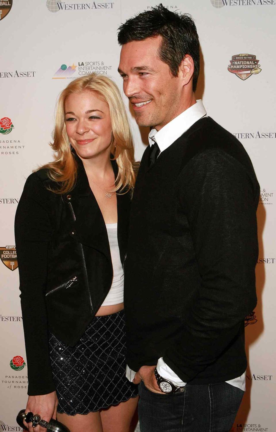 LeAnn Rimes and actor Eddie Cibrian arrive at the 2010 Official BCS National Championship Party at the Pasadena Convention Center on January 6, 2010 in Pasadena, California