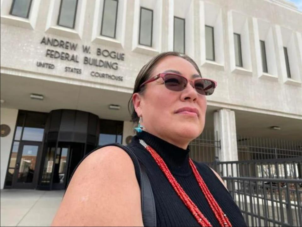 Lynette Adams stands outside the federal courthouse in Rapid City on Wednesday after Donald Eric Cross was sentenced to 10 years in federal prison for abusive sexual contact.